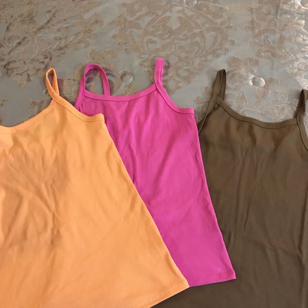 Pink: size: Small.      Brown: Size: M.  Orange: size: M